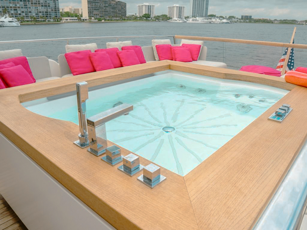 Open dining and lounge area on the main deck of 105 San Lorenzo
